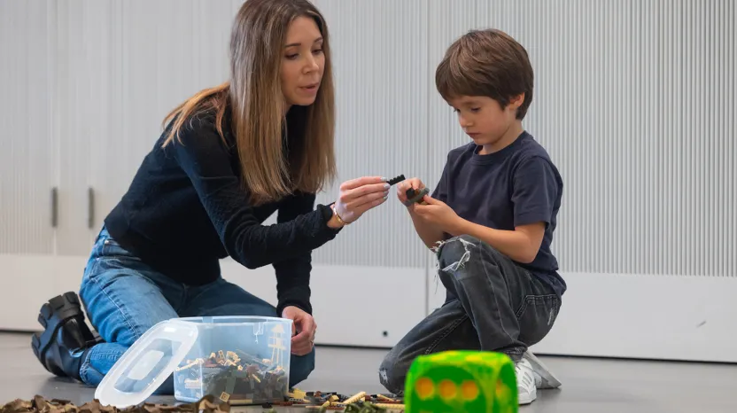 A family taking part in a giant board game challenge